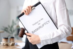 Businesswoman with petition to file for bankruptcy in office