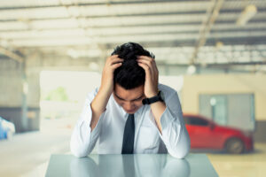 usinessman sad sitting or strait business man sitting chair Express feeling on room