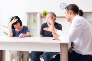 Financial advisor giving retirement advice to old couple