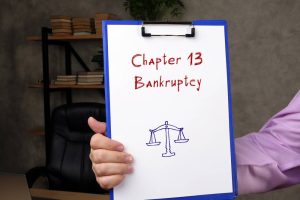 Business concept meaning Chapter 13 Bankruptcy with phrase on the sheet.